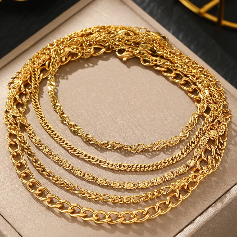 Layered Cuban Chain Anklet Set – 4 Pcs