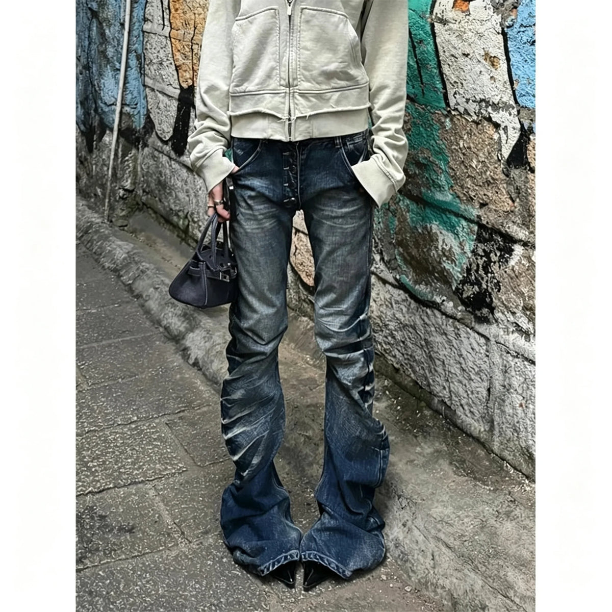Pleated Button Distressed Slim Jeans
